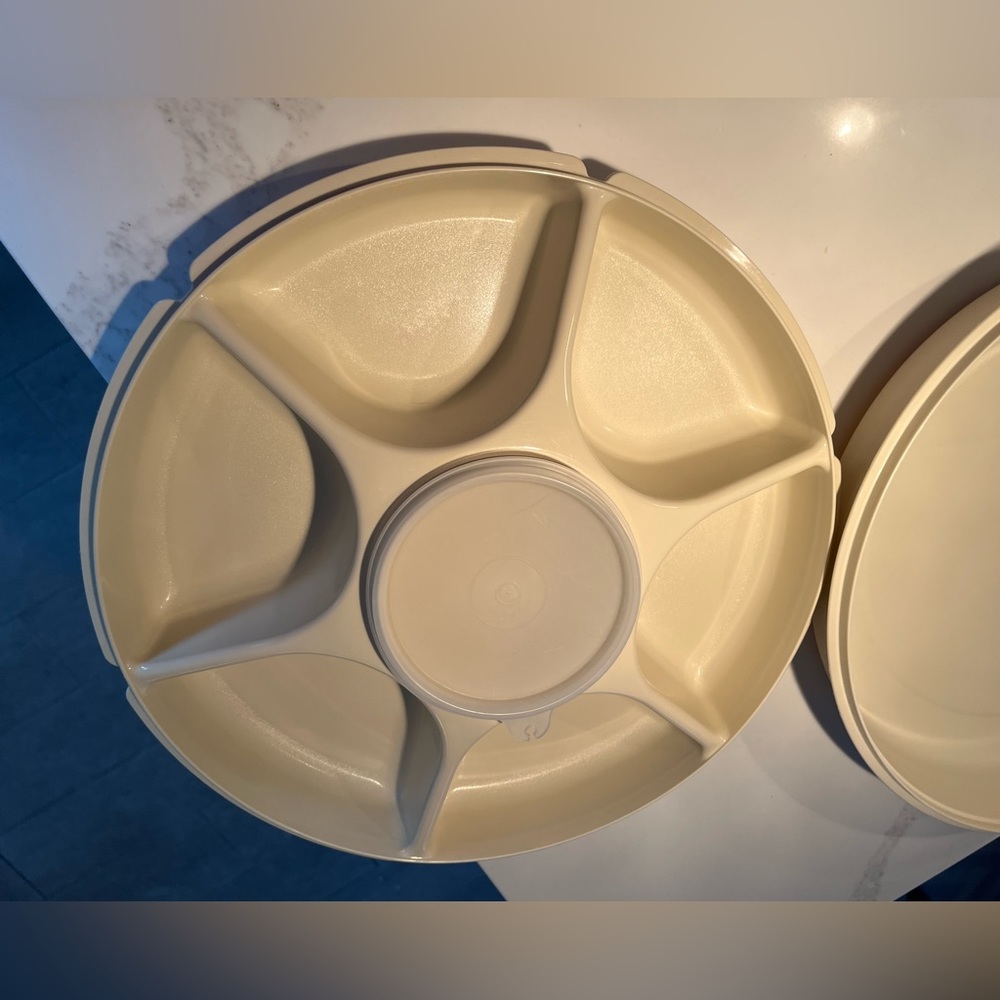 Cream colored chip and dip Tupperware plastic container.